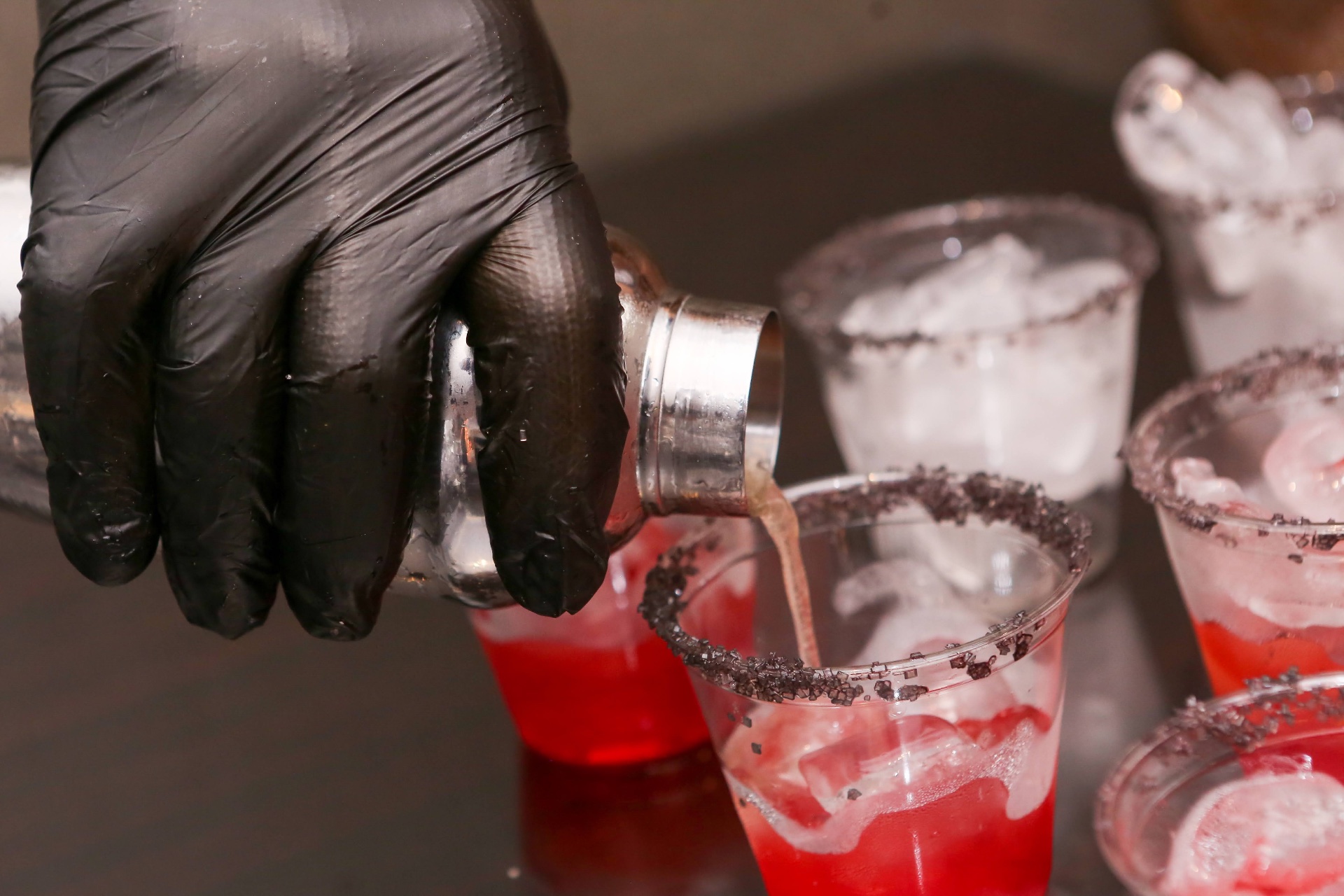 Bartender crafting drinks